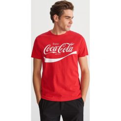 T-shirt z nadrukiem - Czerwony. T-shirty damskie marki Reserved. Za 59.99 zł.