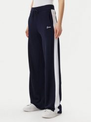 Guess Spodnie dresowe V5GB00 Z3D60 Granatowy Regular Fit. Niebieskie spodnie dresowe damskie Guess, xl, z aplikacjami, z dresówki. Za 319.99 zł.
