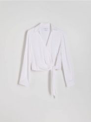 Kopertowa koszula z dodatkiem lnu - biały. Białe koszule damskie Reserved, l, bez wzorów, z tkaniny, bez kołnierzyka, bez ramiączek. W wyprzedaży za 49.99 zł.