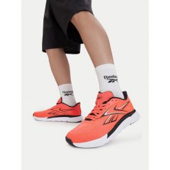 Buty na siłownię Reebok. Czerwone buty sportowe męskie Reebok, bez zapięcia, na fitness i siłownię. Za 399.99 zł.