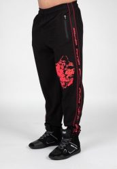 Buffalo Stary trening szkolny Spodnie - Czarny/Czerwony. Czarne spodnie sportowe męskie GORILLA WEAR, l, bez wzorów, z bawełny, na fitness i siłownię. Za 252.00 zł.