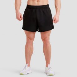 Spodenki męskie fitness luźne czarne Unity. Czarne krótkie spodenki sportowe męskie GYMBEAM, m, bez wzorów, z bawełny, na fitness i siłownię. Za 76.90 zł.