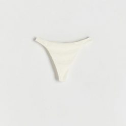 Dół od bikini - złamana biel. Bikini damskie Reserved, l, bez wzorów. W wyprzedaży za 19.99 zł.