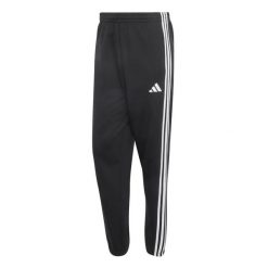 Spodnie dresowe tapered adidas Essentials 3-Stripes Fleece Cuffed. Czarne spodnie sportowe męskie Adidas, m, bez wzorów, z dresówki, na fitness i siłownię. Za 311.99 zł.