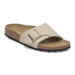Klapki damskie Birkenstock Catalina Bs. Brązowe klapki damskie Birkenstock, bez wzorów, z materiału, bez obcasa. Za 603.00 zł.