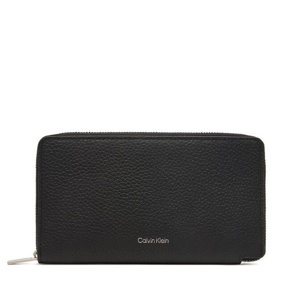 Portfel Calvin Klein. Czarne portfele męskie Calvin Klein, bez wzorów. Za 369.99 zł.