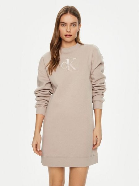 Calvin Klein Jeans Sukienka dzianinowa J20J224834 Beżowy Relaxed Fit. Brązowe sukienki damskie Calvin Klein Jeans, xxs, bez wzorów, z bawełny, bez kołnierzyka, bez ramiączek. Za 259.99 zł.