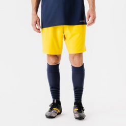 Spodenki piłkarskie Kipsta Viralto Club. Żółte krótkie spodenki sportowe męskie KIPSTA, l, bez wzorów, z elastanu, do biegania. Za 39.99 zł.
