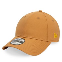 Czapka z daszkiem New Era. Żółte czapki i kapelusze damskie New Era, bez wzorów. Za 79.99 zł.