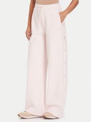 Guess Spodnie dresowe V5BB12 KCX22 Różowy Wide Leg. Czerwone spodnie dresowe damskie Guess, xl, z aplikacjami, z dresówki. Za 379.99 zł.