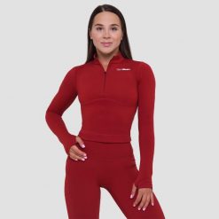 Koszulka damska fitness z zamkiem czerwona Ignite. Czerwone koszulki sportowe damskie GYMBEAM, s, bez wzorów, z dresówki, bez kołnierzyka, bez ramiączek, na fitness i siłownię. Za 114.90 zł.