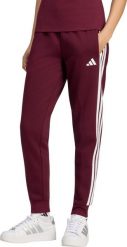 Adidas Spodnie damskie Essentials 3-Stripes Fleece Slim bordowe KF8321 M. Czerwone spodnie sportowe damskie Adidas, m, bez wzorów. Za 236.51 zł.