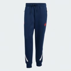 Spodnie France Travel. Niebieskie spodnie sportowe męskie Adidas, bez wzorów, z dresówki. Za 439.00 zł.