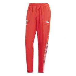 Spodnie dresowe Prematch Bayern Munich 2023/24. Czerwone spodnie sportowe męskie Adidas, bez wzorów, z dresówki, do piłki nożnej. Za 293.50 zł.