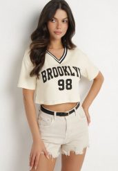 Jasnobeżowy Bawełniany T-shirt z Napisem Nitanelia. Brązowe bluzki damskie Born2be, m, bez wzorów, z bawełny, bez kołnierzyka. Za 29.99 zł.