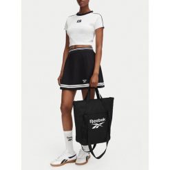 Torebka Reebok. Czarne torebki do ręki damskie Reebok, bez wzorów, bez dodatków. Za 129.99 zł.