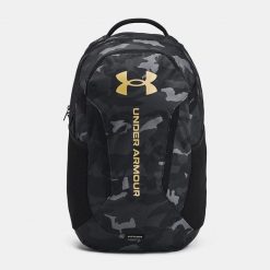 Plecak sportowy miejski szkolny Under Armour Hustle 6 29 litrów. Brązowe plecaki damskie Under Armour, bez wzorów, sportowe. Za 248.30 zł.