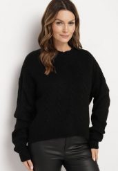 Czarny Sweter Krótki z Wycięciem na Plecach Torine. Czarne swetry damskie Born2be, m, bez wzorów, z jeansu, eleganckie, bez kołnierzyka, bez ramiączek, krótkie, bez kaptura. Za 109.99 zł.