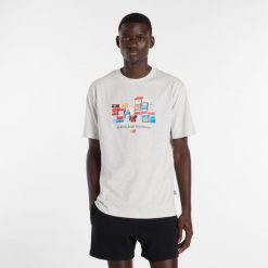 Koszulka męska New Balance MT61H0DXAHH – szara. Szare koszulki sportowe męskie New Balance, l, z aplikacjami, z bawełny, bez kołnierzyka, bez ramiączek. Za 169.99 zł.