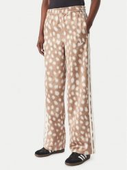 Adidas Spodnie dresowe Firebird KT2144 Brązowy jasny Wide Leg. Brązowe spodnie dresowe damskie Adidas, xs, bez wzorów, z dresówki. Za 349.99 zł.