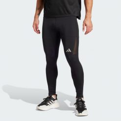Legginsy adidas Run It. Czarne legginsy sportowe męskie Adidas, m, bez wzorów, z materiału, do biegania. W wyprzedaży za 129.35 zł.