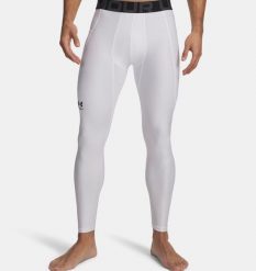 Under Armour UA HG ARMOUR LEGGINGS Legginsy męskie. Białe legginsy sportowe męskie Under Armour, l, bez wzorów, z elastanu, na fitness i siłownię. W wyprzedaży za 125.99 zł.