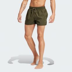 Szorty Essentials Logo CLX. Brązowe krótkie spodenki sportowe męskie Adidas, m, bez wzorów, z materiału, do pływania. Za 130.99 zł.
