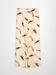 Spodnie wide leg z wiskozy z domieszką lnu z abstrakcyjnym wzorem - wielobarwny. Spodnie materiałowe damskie Sinsay, l, bez wzorów, z wiskozy. Za 49.99 zł.