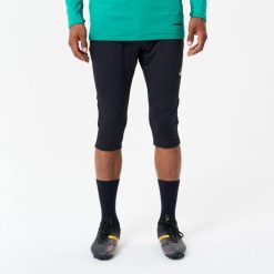 Spodnie piłkarskie 3/4 Kipsta CLR. Czarne spodnie sportowe męskie KIPSTA, l, bez wzorów, z elastanu, na fitness i siłownię. Za 89.99 zł.