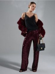 Spodnie wide leg z błyszczącymi cekinami - bordowy. Czerwone spodnie materiałowe damskie Sinsay, l, bez wzorów. Za 69.99 zł.