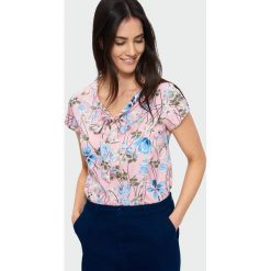 Elegancka bluzka z wiązanym dekoltem. Bluzki damskie Greenpoint. Za 24.99 zł.