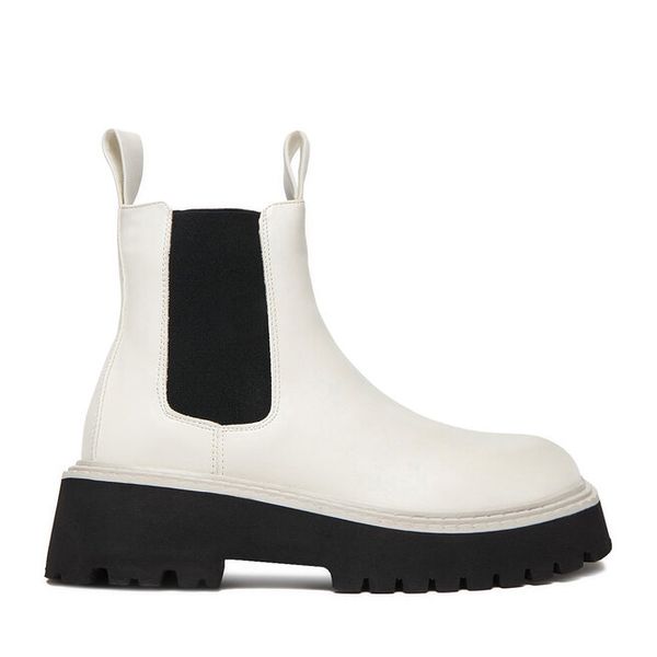 Sztyblety DeeZee. Białe botki damskie DeeZee, bez obcasa, na płaskiej podeszwie, bez zapięcia. Za 229.99 zł.