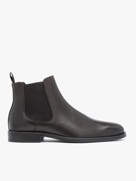 Brązowe skórzane sztyblety. Brązowe botki męskie Ryłko, bez wzorów, ze skóry, eleganckie, przed kolano, bez zapięcia. Za 599.99 zł.