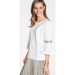 Koszulka w kolorze białym. T-shirty damskie marki Heine. W wyprzedaży za 86.95 zł.