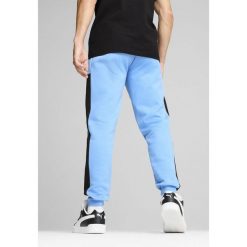 Męskie spodnie dresowe Around The Block PUMA Team Light Blue. Niebieskie spodnie sportowe męskie Puma, m, bez wzorów, z dresówki, do biegania. W wyprzedaży za 119.00 zł.