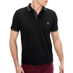 Koszulka polo w kolorze czarnym. Koszulki polo męskie marki RNT23. W wyprzedaży za 69.95 zł.