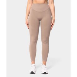 Legginsy bezszwowe Carpatree Accolade beżowe. Brązowe legginsy dla dziewczynek Carpatree, bez wzorów, z dzianiny, długie. Za 169.99 zł.