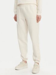 DKNY Sport Spodnie dresowe DP5P3585 Beżowy Regular Fit. Brązowe spodnie dresowe damskie DKNY Sport, xl, bez wzorów, z dresówki. Za 179.99 zł.