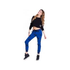 SPODNIE W GWIAZDY - NIEBIESKIE. Niebieskie spodnie materiałowe damskie Heroesque. Za 189.00 zł.