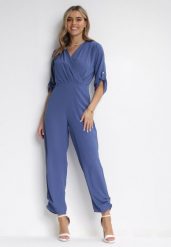 Granatowy Długi Kombinezon z Kopertowym Dekoltem Lauretia. Niebieskie sukienki damskie Born2be, l, bez wzorów, bez kołnierzyka, bez ramiączek, maxi, kopertowe. Za 59.99 zł.