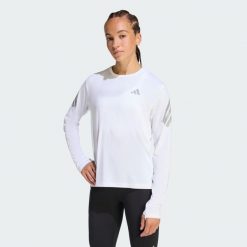 Koszulka z długim rękawem adi365 CLIMACOOL. Białe koszulki sportowe damskie Adidas, bez wzorów, sportowe, bez kołnierzyka. Za 179.00 zł.