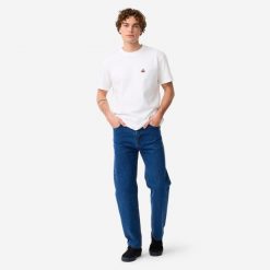 Dżinsy na deskorolkę DN900 z grubej bawełny indygoProsty luźny krój "relaxed". Jeansy męskie Decathlon, eleganckie. Za 179.99 zł.