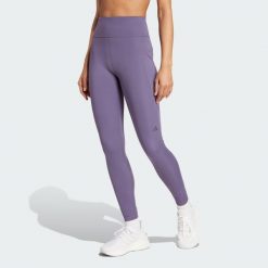 Legginsy Own the Run 7/8. Fioletowe legginsy damskie Adidas, xs, bez wzorów, z materiału. W wyprzedaży za 217.62 zł.