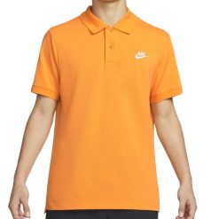 Koszulka polo męska Nike CJ4457-886. Brązowe koszulki polo męskie Nike, m, bez wzorów, sportowe, bez ramiączek. Za 99.00 zł.