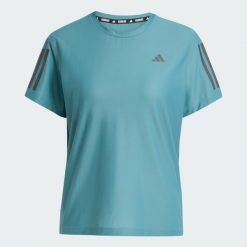 Koszulka Own The Run. Niebieskie koszulki sportowe damskie Adidas, xs, bez wzorów, z materiału, bez kołnierzyka, bez ramiączek, do biegania. Za 149.00 zł.