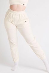 Spodnie dresowe LOEWI prążkowane, miękka bawełna 450 g/m² – żółty. Żółte spodnie dresowe damskie AESTHETIC WOLF, m, bez wzorów, z bawełny. Za 129.99 zł.