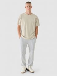 4F T-shirt oversize z nadrukiem męski - beżowy L. Brązowe koszulki sportowe męskie 4f, l, bez wzorów, z bawełny, bez kołnierzyka, bez ramiączek. W wyprzedaży za 29.99 zł.
