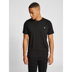 HUMMEL bluzka bawełniana hmlIC FRED T-SHIRT. Czarne koszulki sportowe męskie Hummel, bez wzorów, z bawełny, sportowe, bez kołnierzyka. Za 49.99 zł.