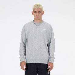 Bluza męska New Balance MT41507AG – szara. Szare bluzy męskie New Balance, l, z aplikacjami, z bawełny, bez kaptura. Za 279.99 zł.