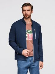 Strukturalna kurtka biker męska ze stójką – ciemnoniebieska V1. Niebieskie kurtki męskie Ombre Clothing, m, bez wzorów, z dzianiny, eleganckie, bez kaptura. W wyprzedaży za 217.49 zł.